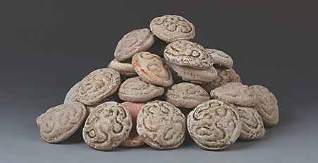 江宁华西村西汉墓出土的陶冥币（“金饼”）